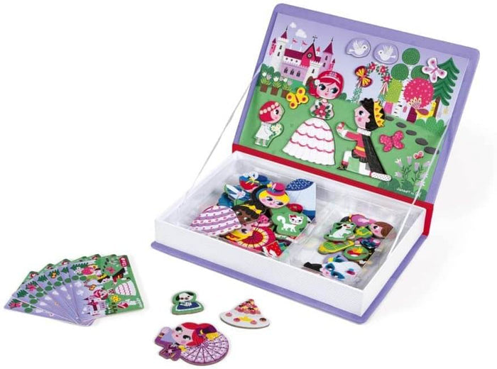 Purple book-shaped toy box open showing a magnetic fairytale scene, colorful character magnets, and reference cards.