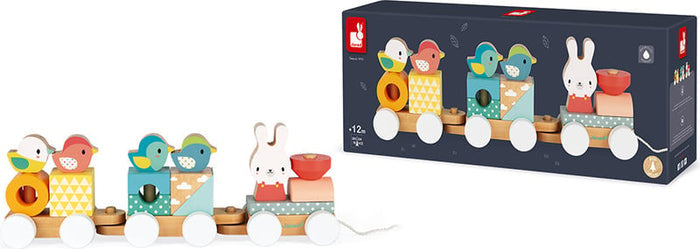 Wooden pull-along train with pastel animal figures and patterned blocks, shown next to its navy blue retail box.