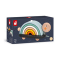Wooden turtle pull toy with five colorful stacking arches on its back, shown in its dark blue retail box.