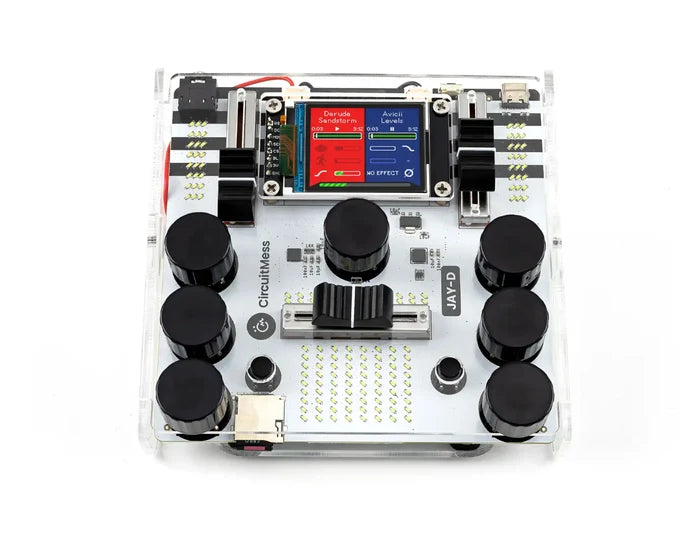 Square DIY DJ mixer with a clear case, white circuit board, black knobs, sliders, and a small color display screen.