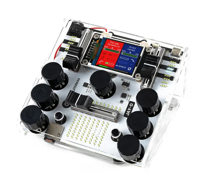 Clear DIY DJ mixer featuring black knobs, sliding faders, and a color LCD screen on a visible white circuit board.