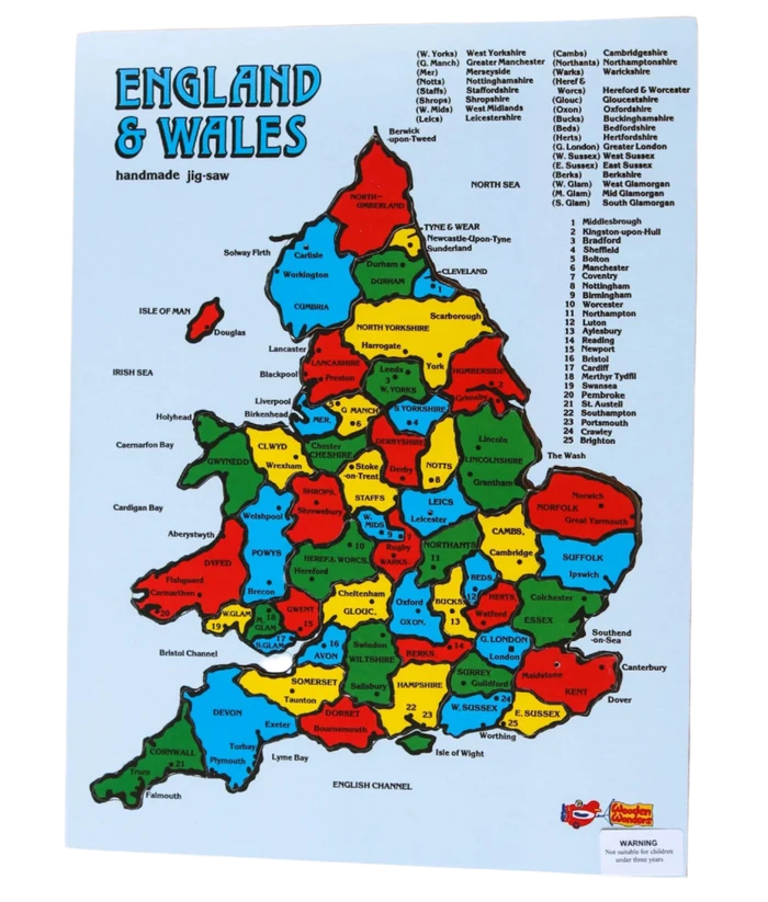 Colorful handmade wooden map puzzle of England and Wales with vibrant multi-colored counties and city labels.