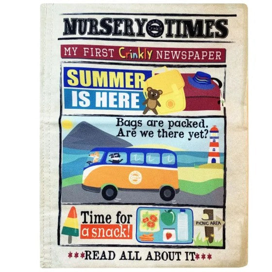Cloth book styled as Nursery Times newspaper with colorful summer illustrations of a camper van and travel snacks.