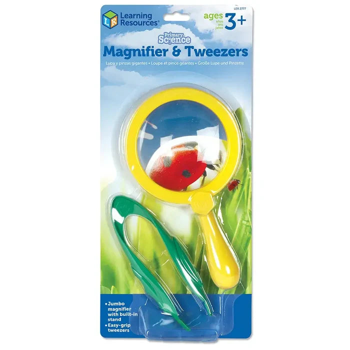 Yellow magnifying glass and green plastic tweezers in retail packaging featuring a ladybug graphic.