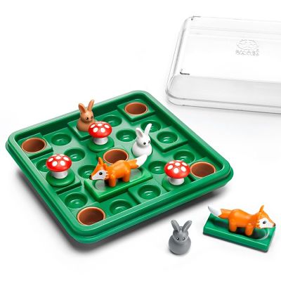 Green square game board with small rabbit, orange fox, and red mushroom figures, plus a clear plastic storage lid.