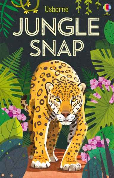 Spotted yellow leopard walking forward through green jungle leaves and pink flowers on a dark card game box.
