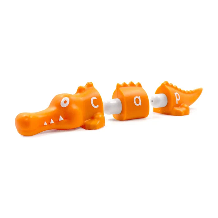 Three orange snap-together alligator segments with white letters c, a, and p, spelling the word cap.