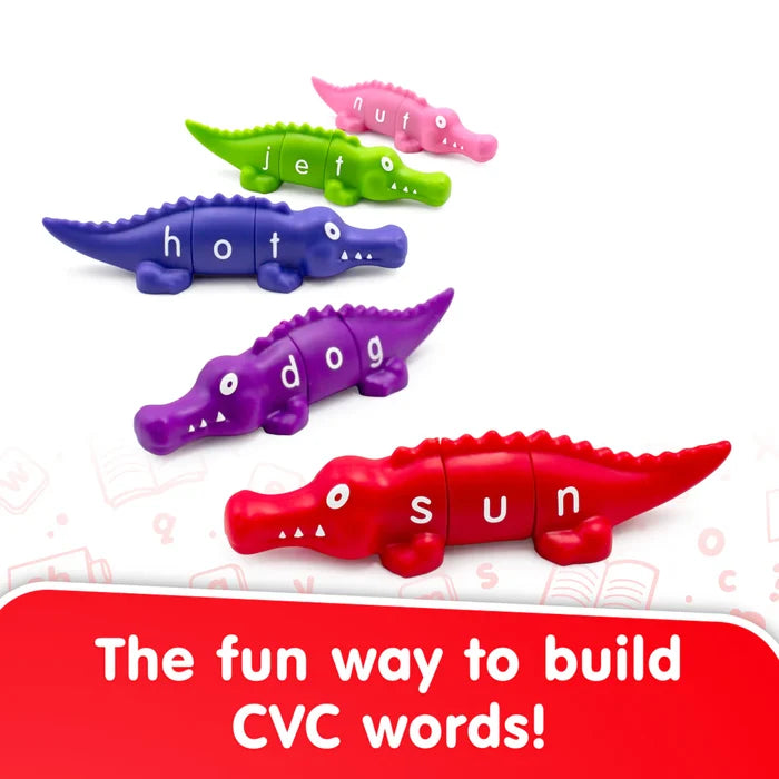 Five colorful snap-together alligator toys with segments spelling out CVC words like nut, jet, hot, dog, and sun.