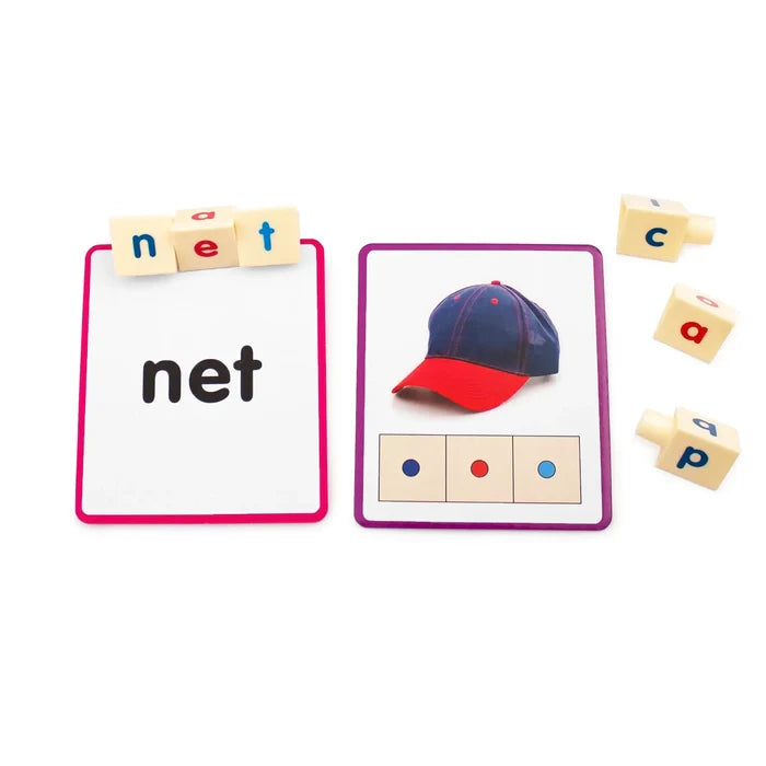Phonics cards and letter blocks spelling net and cap beside a picture of a red and blue baseball hat.
