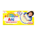 Bright yellow box for Magnetic Rainbow Alphabet Arc toy with a rainbow logo and a girl playing with a white board.