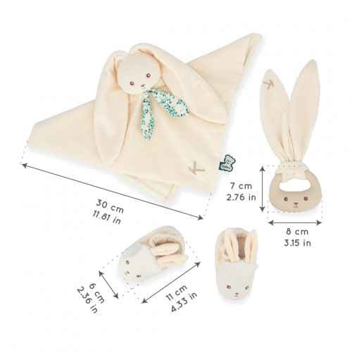 Cream plush bunny comforter, teething ring, and booties with size dimensions labeled in centimeters and inches.