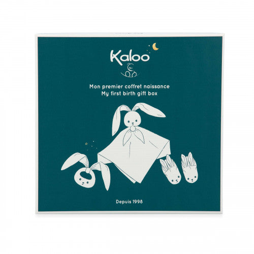 Dark teal square gift box with white illustrations of a rabbit comforter, ring rattle, and soft baby booties.