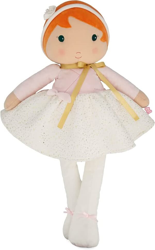 Plush doll with orange hair, pink top, gold ribbon, and white tutu with gold spots and long white legs.