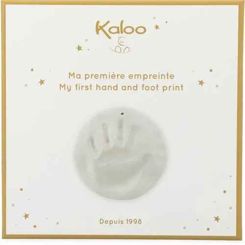 White box with gold trim and stars featuring a round plaster baby handprint mold in the center.