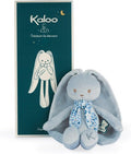 Plush light blue bunny with long ears and floral scarf next to a tall teal Kaloo gift box.