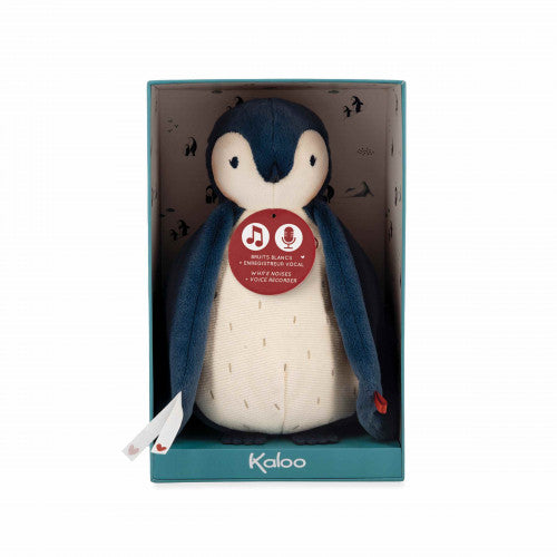 Plush navy and cream penguin in a teal display box, featuring a red chest tag with musical note and microphone icons.