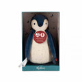 Plush navy and cream penguin in a teal display box, featuring a red chest tag with musical note and microphone icons.