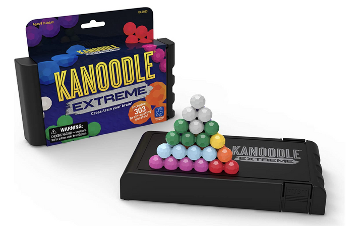 Kanoodle Extreme puzzle with a 3D pyramid of colorful multifaceted beads on a black game base next to its box.