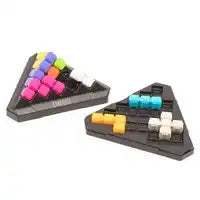 Two black triangular puzzle trays with colorful, rounded cubic pieces in pink, orange, yellow, blue, and white.