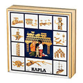 Square wooden box lid featuring a collage of models like a bridge, robot, and boat built from natural wood planks.