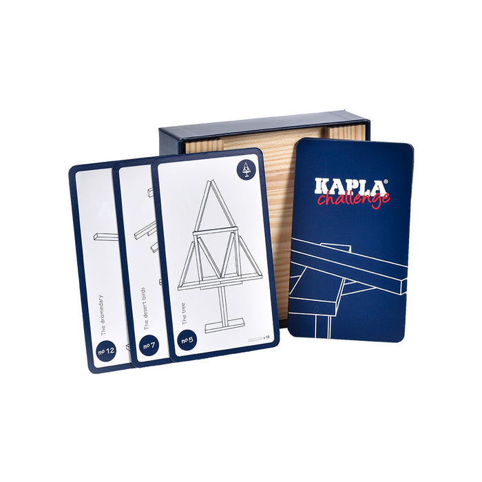 White cards showing block structures next to a blue Kapla Challenge card and a wooden box.