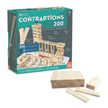 Teal box showing an intricate wooden marble run next to stacks of light-colored, rectangular pine building planks.