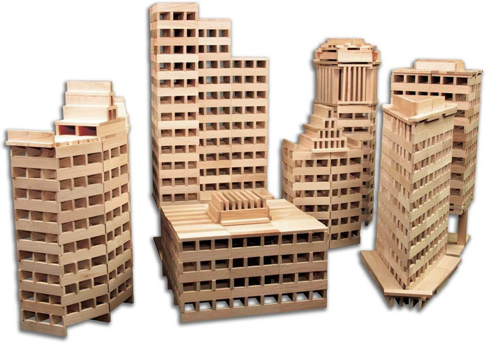 Intricate model skyscrapers and city structures built from uniform, light-colored rectangular wooden planks.