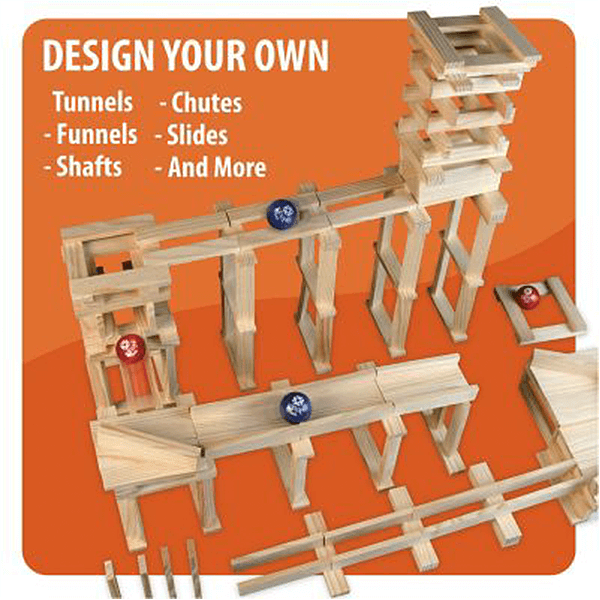 Elaborate marble run built from light wood planks with towers and chutes, featuring blue and red marbles.