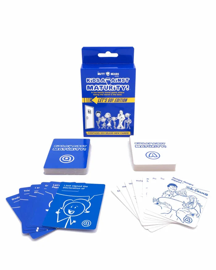 Blue travel card game box and decks of blue and white cards with stick-figure illustrations and funny text prompts.