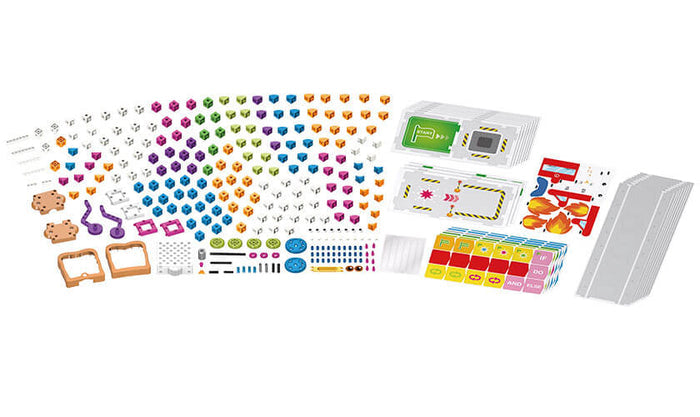Assorted colorful building blocks, gears, wheels, and coding cards for a children's STEM robotics and activity set.