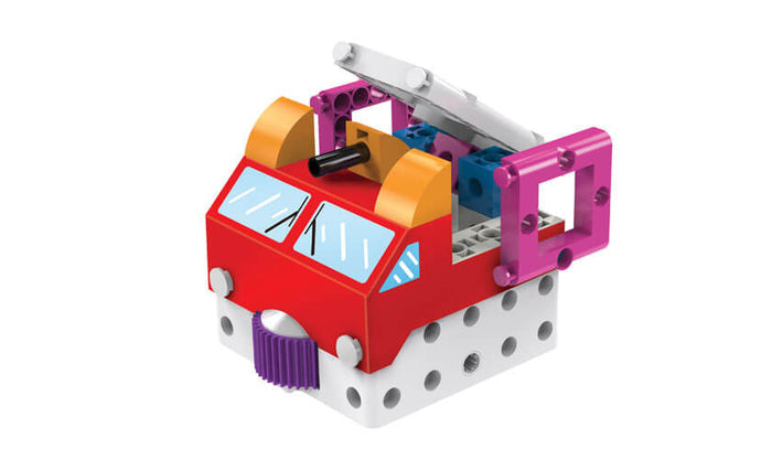 Red toy truck robot with pink side frames, yellow accents, and a purple gear on a white building block base.