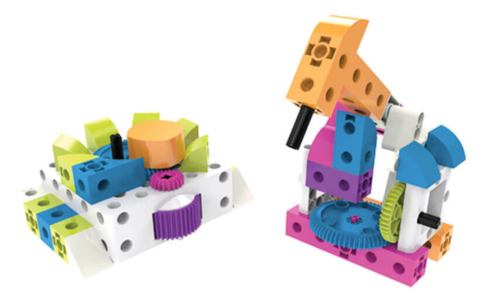Two colorful mechanical toy models made from plastic blocks and gears in orange, pink, blue, and green.