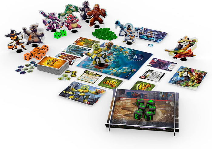 Colorful board game set with 10 monster standees, a game board, dice tray, cards, and small green cubes.