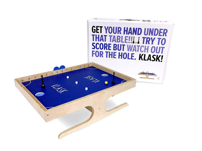 Wooden tabletop game with blue surface, black magnetic strikers, and yellow ball next to its white product box.