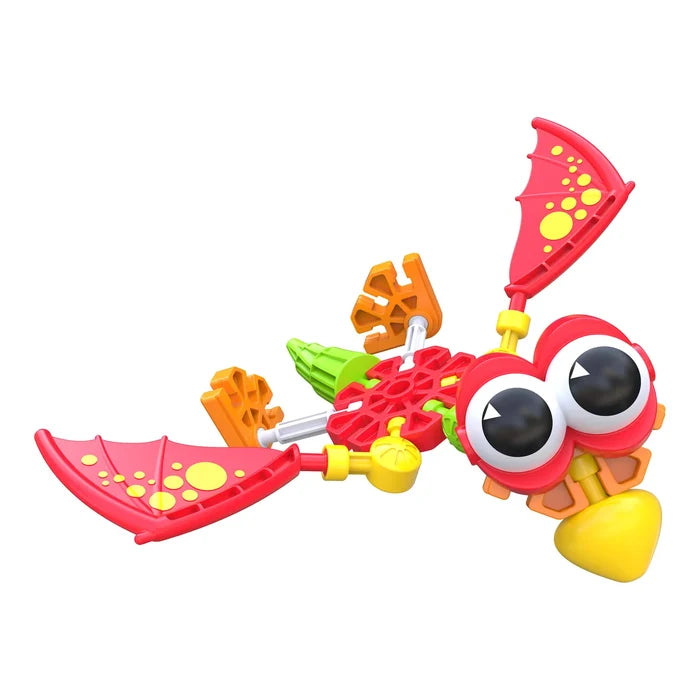 Colorful K'NEX pterodactyl toy with red wings, large googly eyes, and orange feet against a white background.