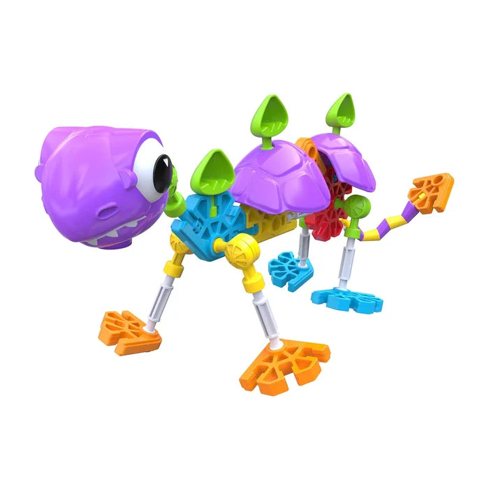 Colorful K'NEX dinosaur figure featuring a large purple head, green back plates, and orange feet.