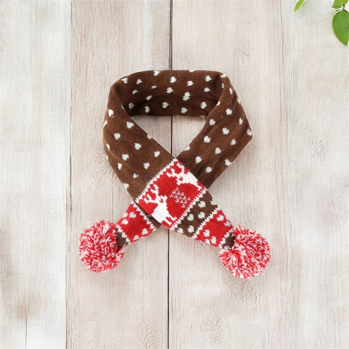 Knitted dog scarf by DogTreatNZ featuring soft, warm fabric with a colorful striped pattern for cozy pet style.