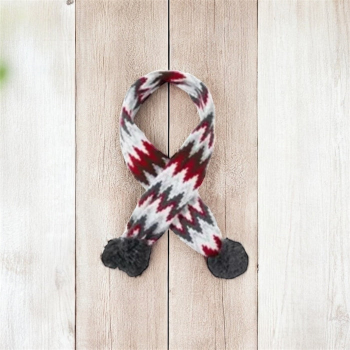 Knitted dog scarf from DogTreatNZ featuring cozy, colorful yarn to keep your pet warm and stylish.