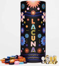 Black floral tube labeled Lacuna beside a pile of colorful starburst tokens and metallic gold and silver pawns.