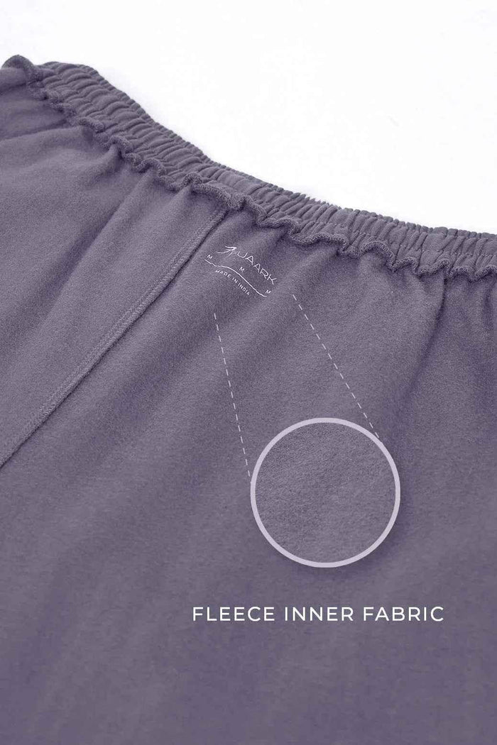 Dark grey Fuaark Nz joggers with relaxed fit, soft fabric, and comfortable waistband, ideal for casual wear and lounging.