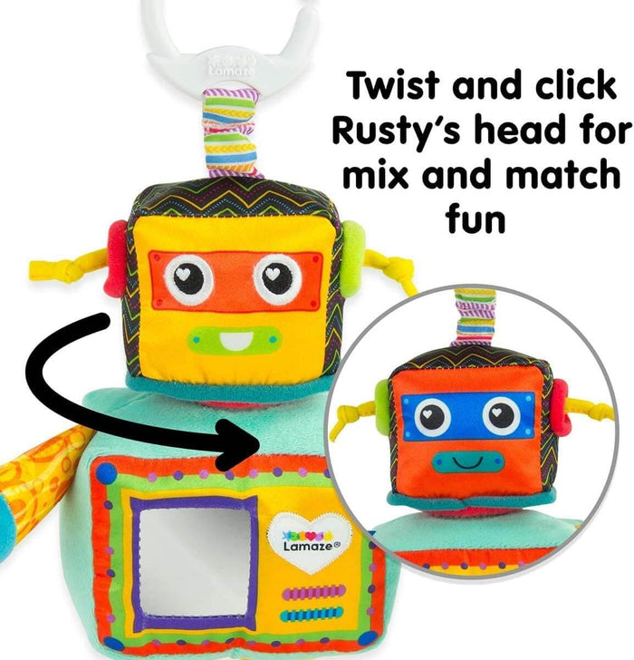 Plush robot toy with a twisting cube head showing different faces, a mirror on its teal body, and a hanging clip.