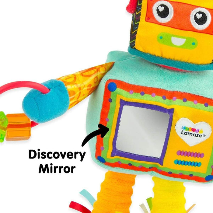 Plush robot toy with a yellow head, heart eyes, and a square Discovery Mirror on its teal chest.