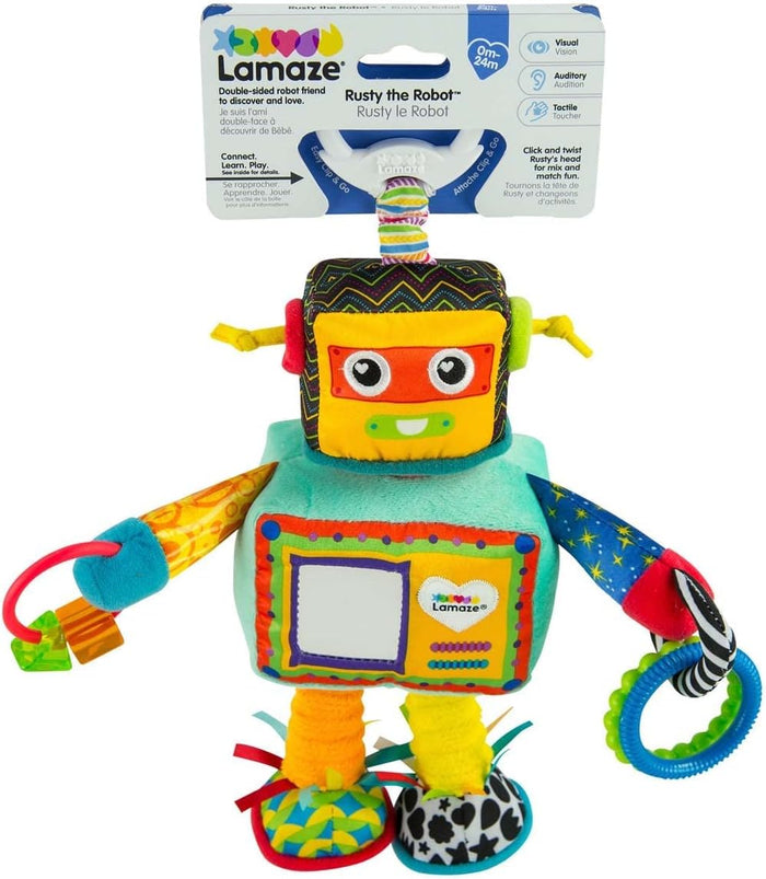 Colorful Lamaze plush robot toy with various patterns, a mirror chest, and teethers, attached to cardboard packaging.