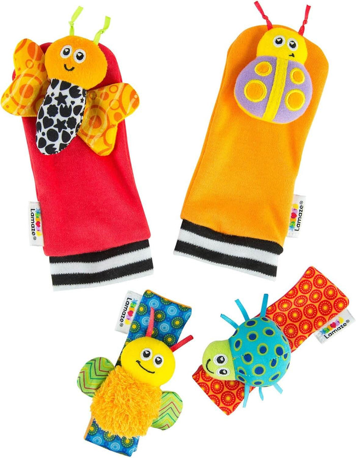 Colorful baby rattle set with bug-themed red and orange socks and blue and red patterned wrist straps.