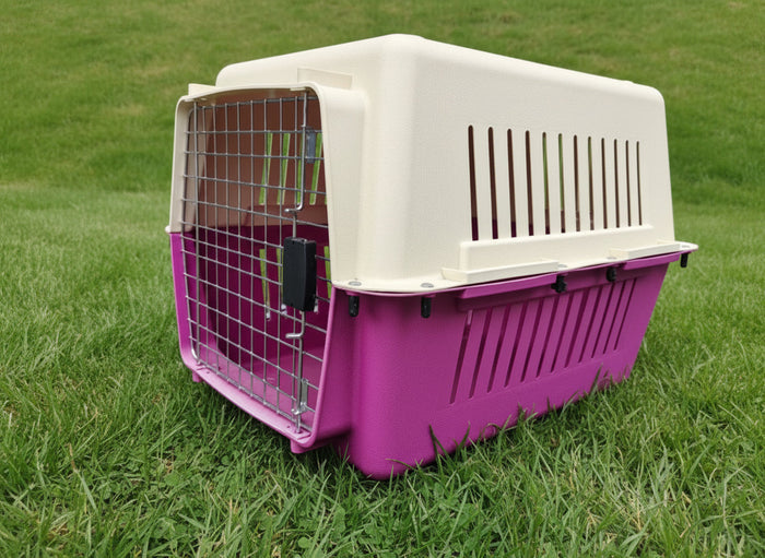 Pink 68cm pet travel cage for dogs and cats with handle and ventilation, ideal for safe transportation.