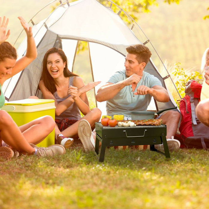 Large black portable charcoal BBQ stove grill with briefcase-style design, ideal for outdoor cooking and grilling.