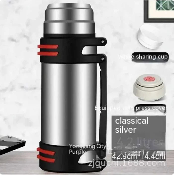 Large blue 1L stainless steel insulated thermos from Mead's Supply & Equipment Outfitters, designed for hot and cold beverages.