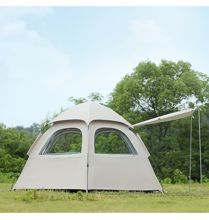 Beige ECOTREK large hexagon double-layer waterproof camping tent set up outdoors with visible waterproof fabric and spacious design.