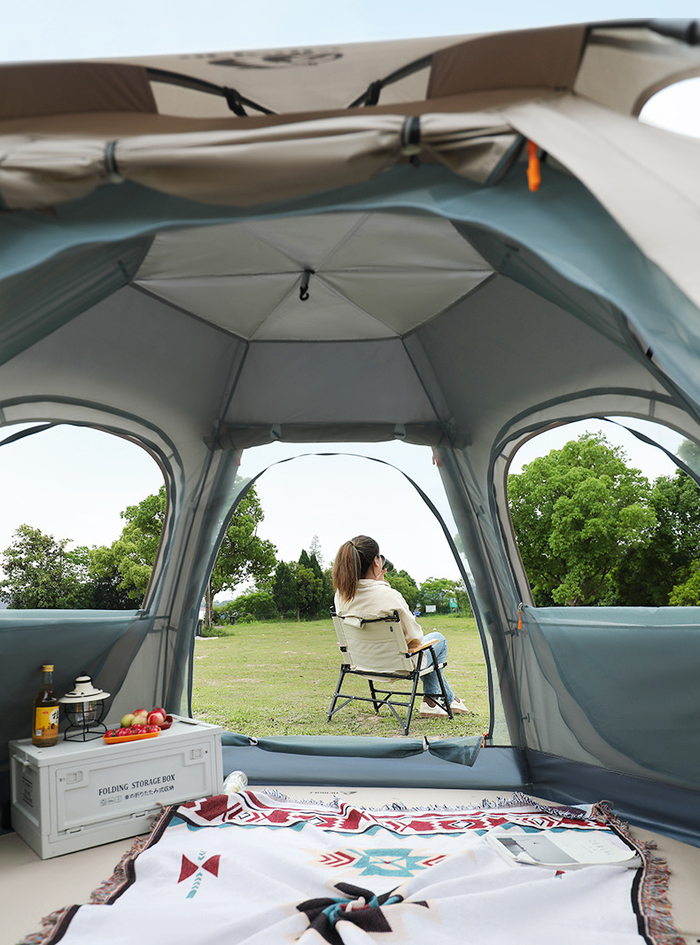 Beige large hexagon double-layer waterproof ECOTREK camping tent set up outdoors on a grassy area.