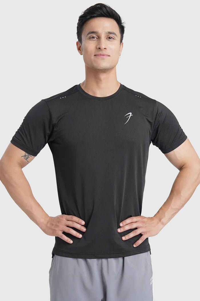 Black laser cut running T-shirt by Fuaark NZ, showing detailed laser cut design and breathable fabric on a mannequin.